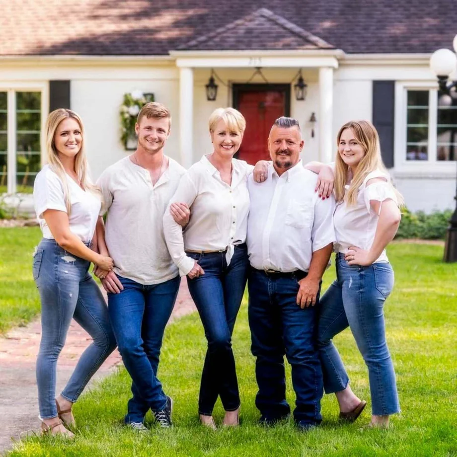 Bill Sutton with his family outdoors